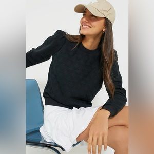 Tuckernuck black puff sleeve pullover.